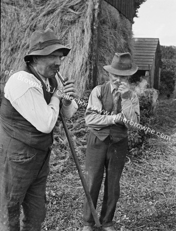 FARMERS RELAX WITH PIPES